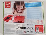 packaging of a children ' s laptop with a red keyboard and mouse