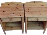 pair of pine wood nightstand tables with drawers on each side
