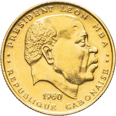une image représentant un gros plan d'une pièce d'or sur laquelle figure le visage d'un homme