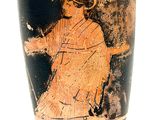 an old vase with a woman on it on display