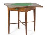 an image of a small table with a green top on a white background