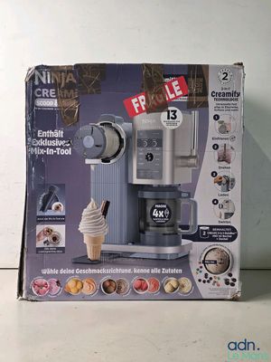 packaging of a coffee maker with ice cream on top of it