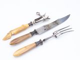 three different types of garden tools on a white surface