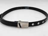 black leather belt with silver buckle on white background