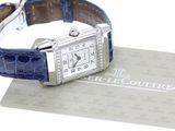 a watch that is sitting on top of a business card