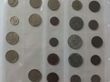 a lot of coins in a plastic bag on a table