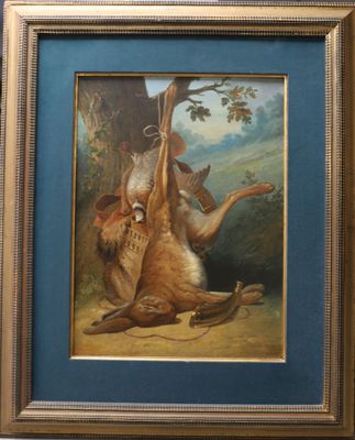 tableau encadré représentant un chien et un oiseau suspendu à un arbre