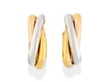 une paire de boucles d'oreilles en or et en argent sur fond blanc