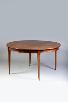 an image of a round table with a wooden top and legs