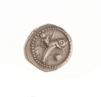 une image représentant une pièce d'argent sur laquelle figure un oiseau