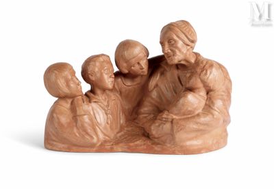 figurine of a group of people sitting on a white surface
