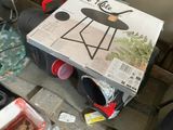 a box that is sitting on a pallet next to other items