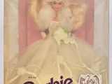 emballage d'une poupée Barbie vêtue d'une robe blanche et d'un voile