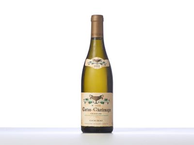 a close up of a bottle of wine on a table