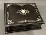 an image of a black and white box with a clock on it