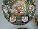 a lot of plates that are sitting on a table