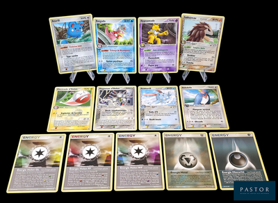 beaucoup de cartes pokemon différentes sur la table