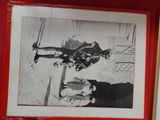 a picture of a man riding a skateboard on the wall