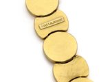 an image of a gold bracelet with five discs on it