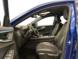 the interior of a car with the door open and the driver ' s seat up