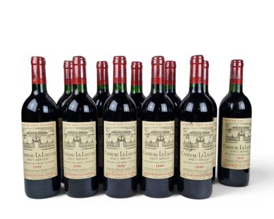 six bottles of red wine are lined up in a row