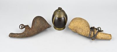 three pieces of wood and metal are sitting next to each other