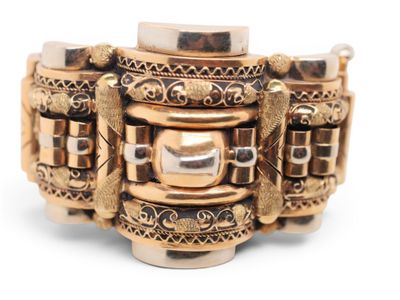 a close up of a gold bracelet with a metal buckle