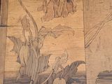 a picture of a painting on the wall of a room