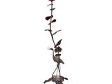 an image of a metal sculpture of a bird and a rose