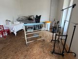 a room that has a table and chairs in it