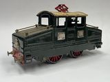 a toy train that is sitting on a white surface