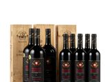 six bottles of red wine in a wooden box