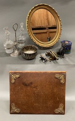 several different types of antique items are displayed on a table