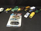 a lot of toy cars and trucks on the table