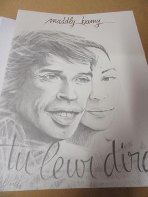 un dessin représentant un homme et une femme sur une feuille de papier