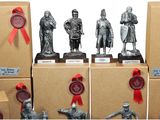 a lot of statues that are on top of boxes