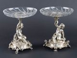 pair of antique silver plated candlesticks with cherensils