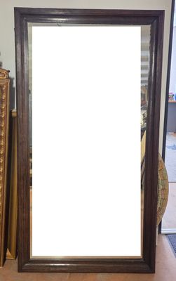 a picture of a large mirror on the floor