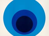 une image représentant un cercle bleu au centre noir sur fond blanc