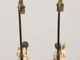 pair of antique brass candles with figurines of a man and a woman