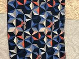 a close up of a piece of fabric on a table