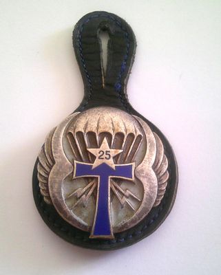 an image of a cross with wings and a star on it