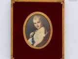 portrait of a baby in a red dress with a gold frame