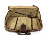 the back view of a brown and tan briefcase with a handle