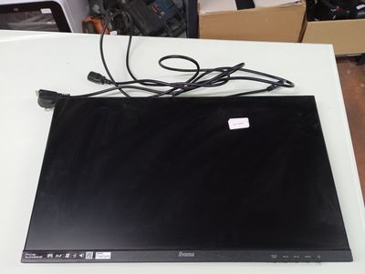 a laptop that is sitting on a white table
