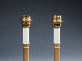 pair of brass table lamps with white glass shades