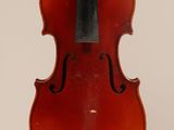 a close up of a violin with a bow on a white background