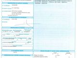 a close up of a document with a picture of a person on it