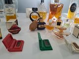 many different types of perfumes on the table