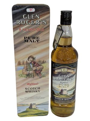 une bouteille de whisky écossais à côté d'un carton